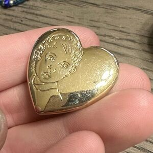 1980s baby face gold brooch